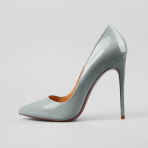 Female blue high heeled shoes over grey